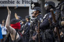 AP PHOTOS:  Images of calm emerge after days of protests