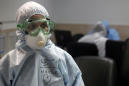 Iran says 10K medics infected as virus fears rise in Mideast