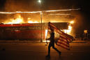 AP photo of flag-bearing protester rockets around the world