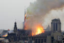 The Latest: Arson ruled out in Notre Dame fire for now