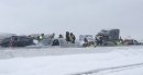 100-vehicle pileup on icy highway kills one person and injures several others