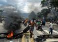 Venezuela army hunts rebels behind raid on military base