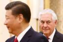 Xi, Tillerson seek stronger ties as N. Korea hails rocket progress