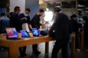 Short queues in China as Apple's newest iPhone 12 hits stores