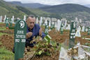 Bosnia: Unnerved by virus denial, survivors mourn their dead
