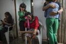 In hard-hit Peru, worry mounts over both COVID-19 and dengue