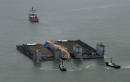 Sunken South Korean ferry slowly emerges three years after disaster