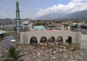 The Latest: Indonesia quake, tsunami deaths climb to 384