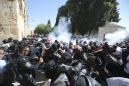 Muslims clash with Israeli police at Jerusalem holy site