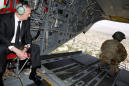U.S. defense secretary in Afghanistan as U.S. looks to craft policy