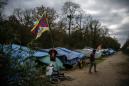 French police clear 600 Tibetan migrants from camp outside Paris