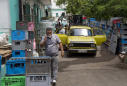 Economy tanking, Cuba launches some long-delayed reforms
