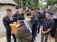 Vietnamese village holds funeral for trafficking victims